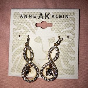 Unused Anne Ak Klein earrings, stainless. Real gold
